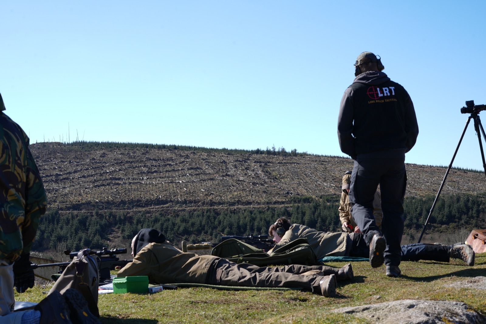 Coaching intro still: rifle in use at Bodmin, bipod, dope book in frame.